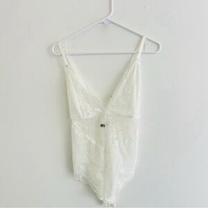 Elegant White Lace Bodysuit